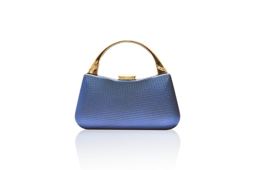 blue clutch bag isolated on white background with clipping path. photo