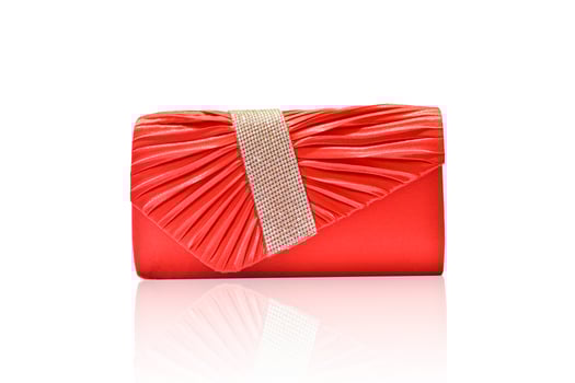 Red clutch bag isolated on white background with clipping path. photo