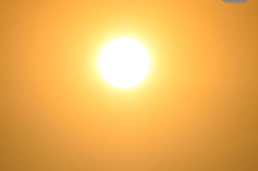 bright sun and orange sky photo