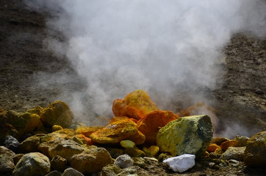 stones with sulfur and smoke photo