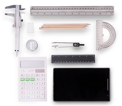 tablet, calculator, ruler, pencil and compass on white background. photo