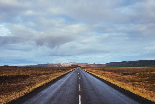 Asphalt road to the mountains Iceland. Beauty world photo