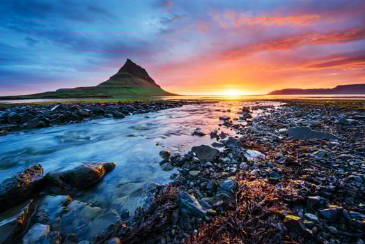 The picturesque sunset over landscapes and waterfalls. Kirkjufell mountain,Iceland photo