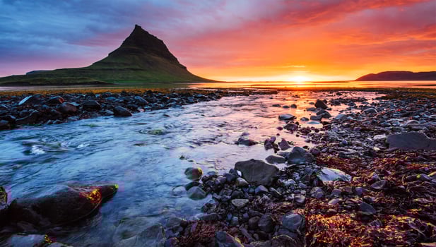 The picturesque sunset over landscapes and waterfalls. Kirkjufell mountain,Iceland photo