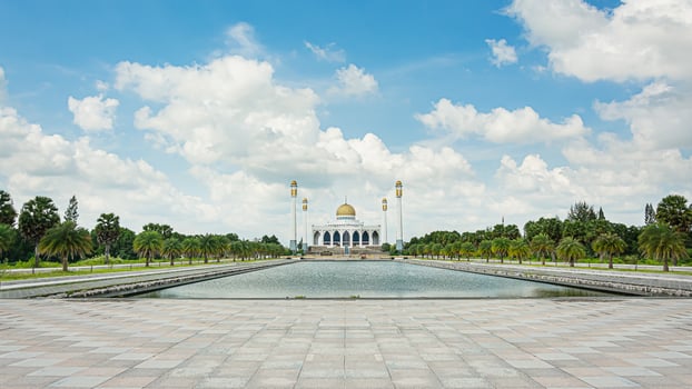 Songkhla Central Mosque with blue sky and cloud over the mosque . Largest Mosque in Thailand photo