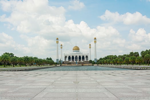 Songkhla Central Mosque with blue sky and cloud over the mosque . Largest Mosque in Thailand photo