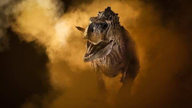 Ekrixinatosaurus Epitaph Dinosaur on smoke background photo