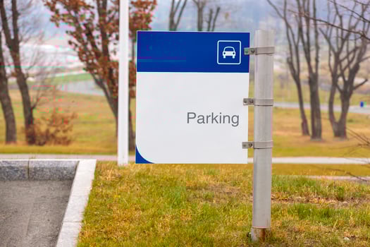 parking sign in the park in autumn. photo