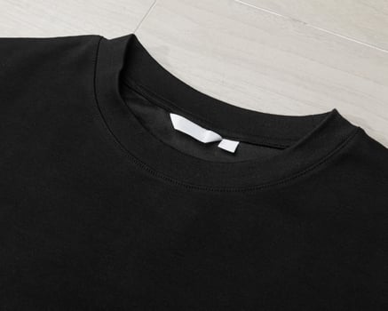 Blank Black Oversized T-shirt mockup template on the floor photo