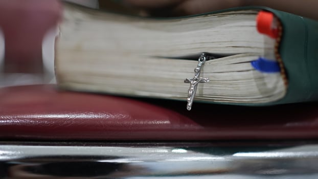 Christian women pray and hold the Scriptures photo