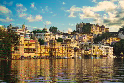 scenery of Pichola lake bank and city palace at udaipur, rajasthan, india photo