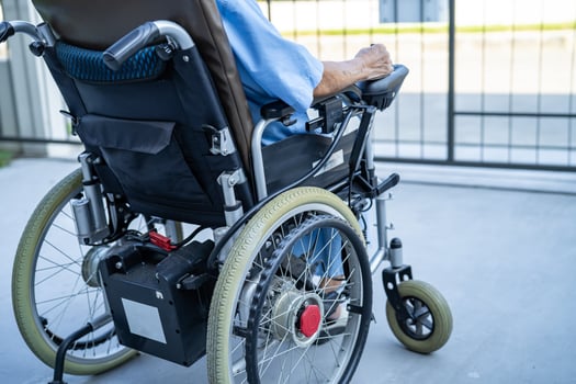 Asian senior or elderly old lady woman patient on electric wheelchair with remote control at nursing hospital ward, healthy strong medical concept photo