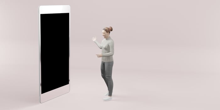 Woman standing with phone smartphone photo