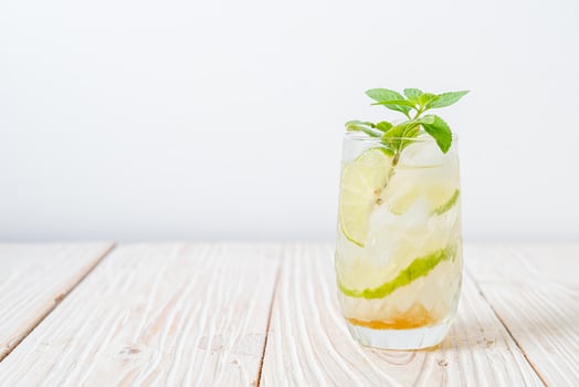 iced honey and lime soda with mint photo