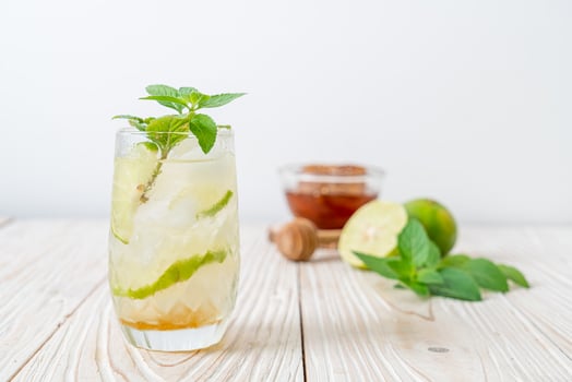 iced honey and lime soda with mint photo