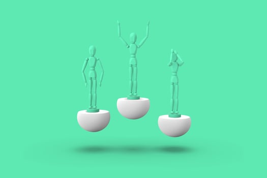 Three toy man of green color on a sports abstract pedestal. photo
