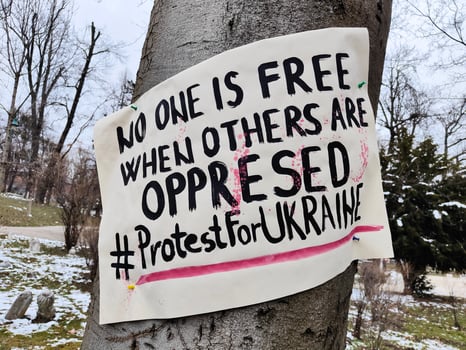 Sarajevo, BiH 09.03.2022. Ukraine protests sign. No one is free until others are oppressed. Anti-war protests. Stop the war. Ukraine and Russia conflict. Solidarity with the people of Ukraine. photo