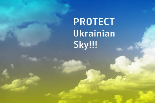 Protect Ukrainian sky text on the background of tinted yellow and blue sky of Ukraine photo