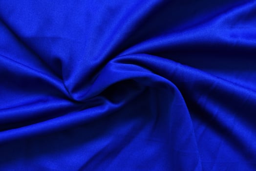 Abstract dark blue crumpled fabric texture background - Smooth elegant blue silk , satin luxury cloth wave photo