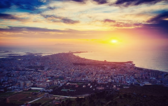 Sunset over the city from on high. photo