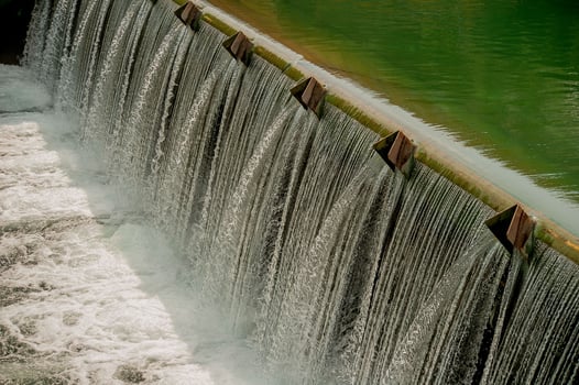 Barrier to slow down the flow of water photo