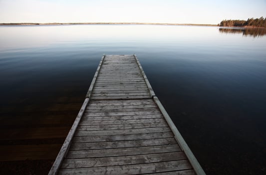 Dock on Northern Manitoba lake photo