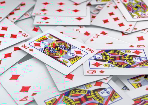 Pile of cards diamonds suite lying on table photo