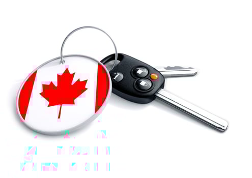 Car keys with Canada flag as keyring. photo
