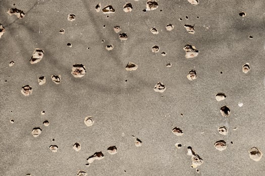 Bullet holes on the facade of a residential building. Stop the war. Armed conflicts. Defund the armies. No to war. photo