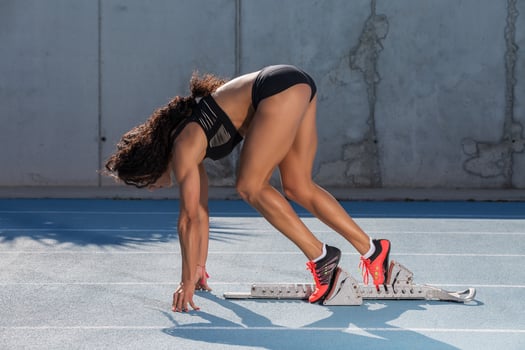 athlete in starting position photo