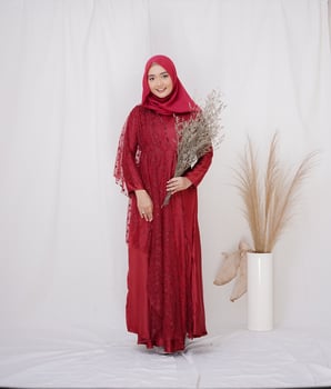 Beautiful islamic female model wearing hijab fashion, a modern lifestyle outfit for muslim woman. Concept a wedding dress, beauty or eidul fitri. A asian girl model wearing hijab on indoor photoshoot photo