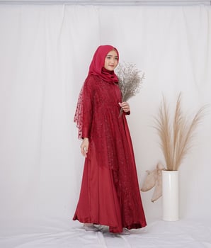 Beautiful islamic female model wearing hijab fashion, a modern lifestyle outfit for muslim woman. Concept a wedding dress, beauty or eidul fitri. A asian girl model wearing hijab on indoor photoshoot photo