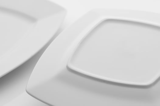 kitchen and restaurant utensils, plates, on a light background photo