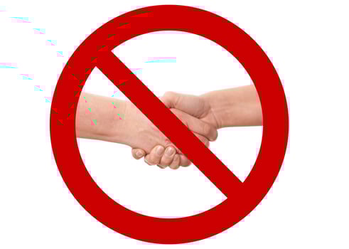 No shaking hands or handshake prohibition sign as hygiene and social distancing measure photo