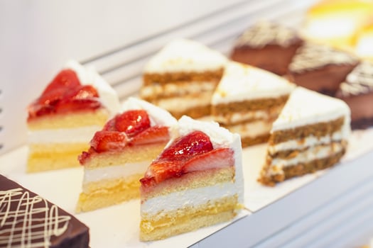 Cakes in the window of a bakery. photo