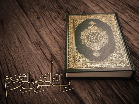 Bismillah  Mean In The Name Of Allah Arabic art  with Koran  holy book of Muslims  public item of all muslims . photo