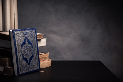 Koran holy book of Muslims  public item of all muslims  on the table , still life photo