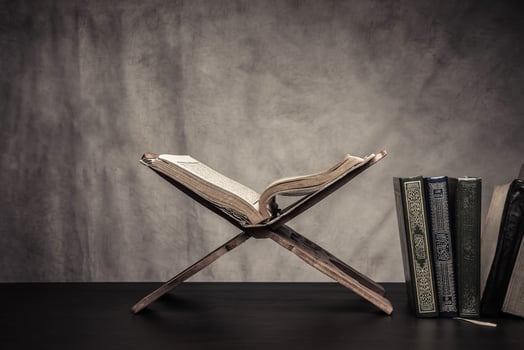 Koran holy book of Muslims  public item of all muslims  on the table , still life photo