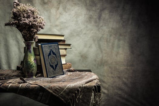Koran holy book of Muslims  public item of all muslims  on the table , still life photo
