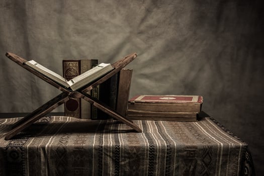 Koran holy book of Muslims  public item of all muslims  on the table , still life photo