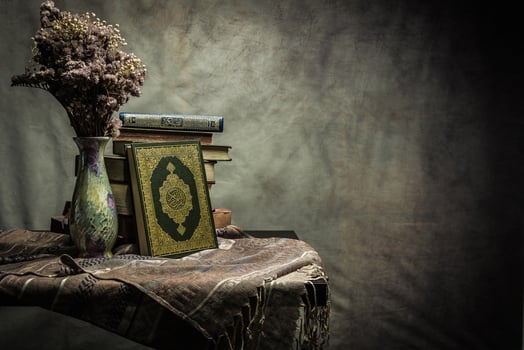 Koran holy book of Muslims  public item of all muslims  on the table , still life photo