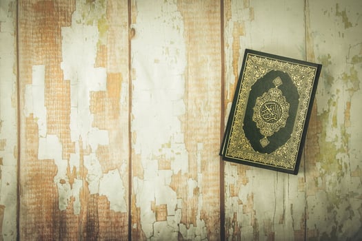 Koran  holy book of Muslims public item of all muslims on the table , still life photo