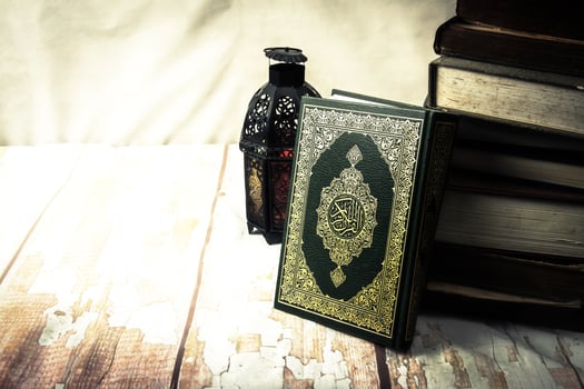 Koran  holy book of Muslims public item of all muslims on the table , still life photo