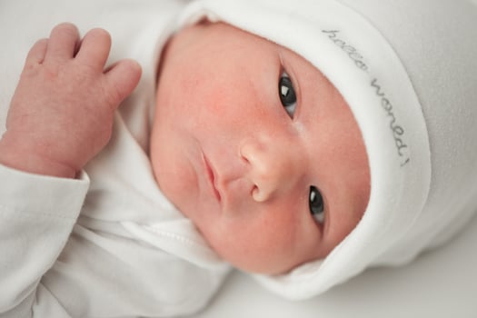 face baby in a white hat photo