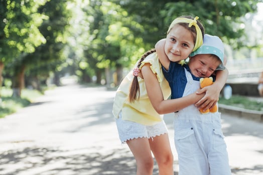 portrait of a little girl and her brother. photo