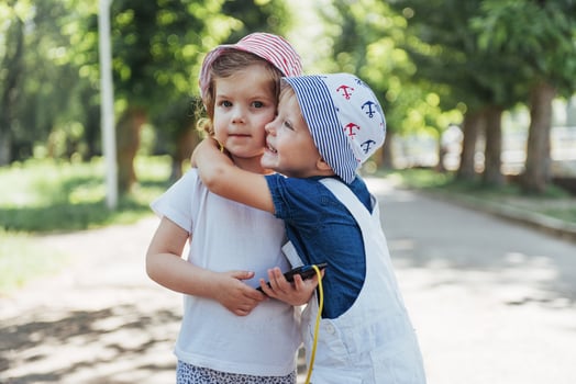 portrait of a little girl and her brother. photo