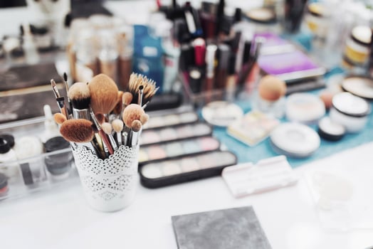 Colorful cosmetics in the workplace. top View photo