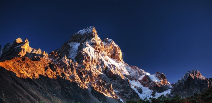 Fantastic scenery and snowy peaks in the first morning sunlight. photo