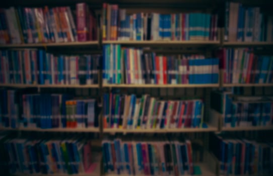 Blurred background as a bookshelf on the wall photo