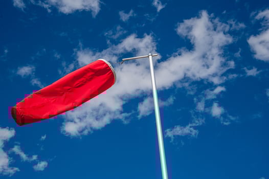 Wind direction indicator at the airport photo